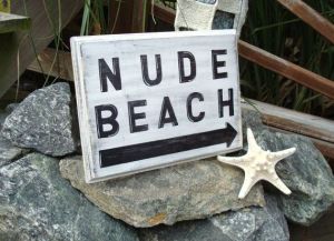 nude beach sign
